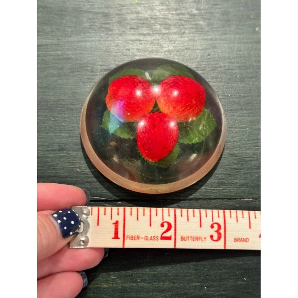 Vintage Lucite paperweight, red strawberries and green leaves